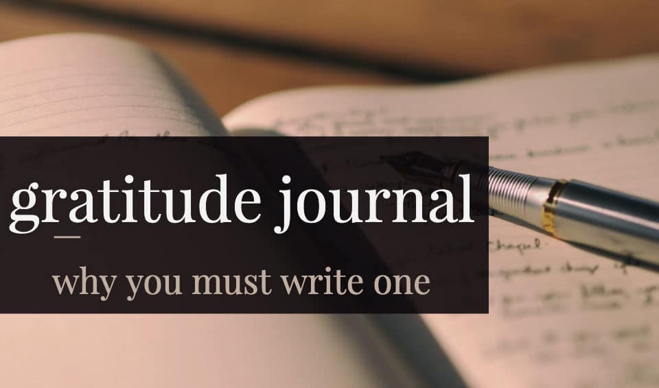 Open gratitude journal with fountain pen on a page, inspiring thoughts on career, leadership, and boosting talent through mindful writing.