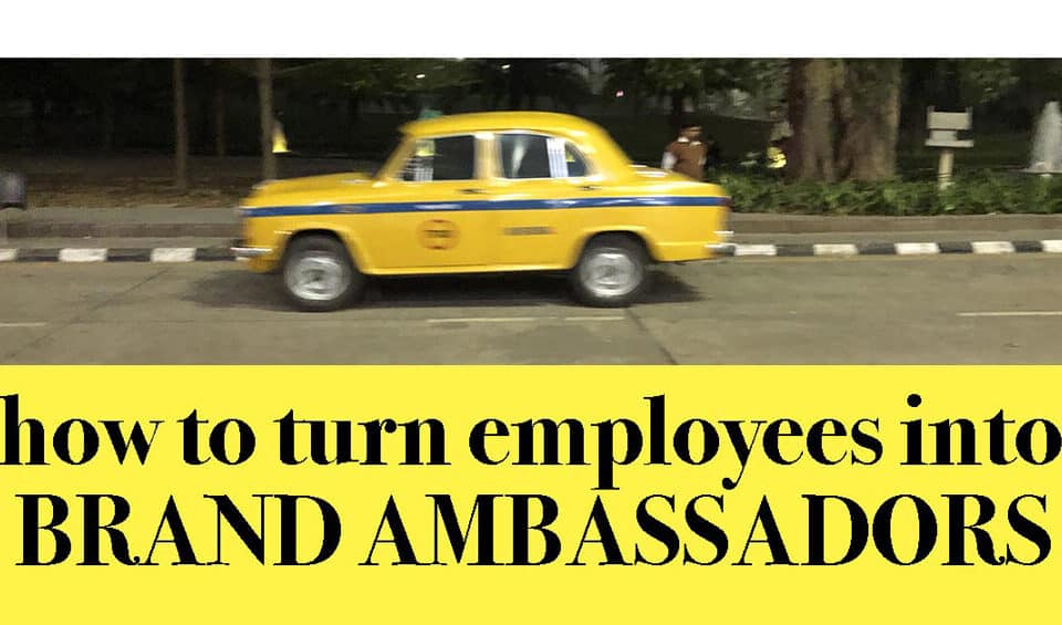 Vintage taxi in motion with tips on transforming employees into brand ambassadors, focusing on career growth, leadership, and HR talent development.